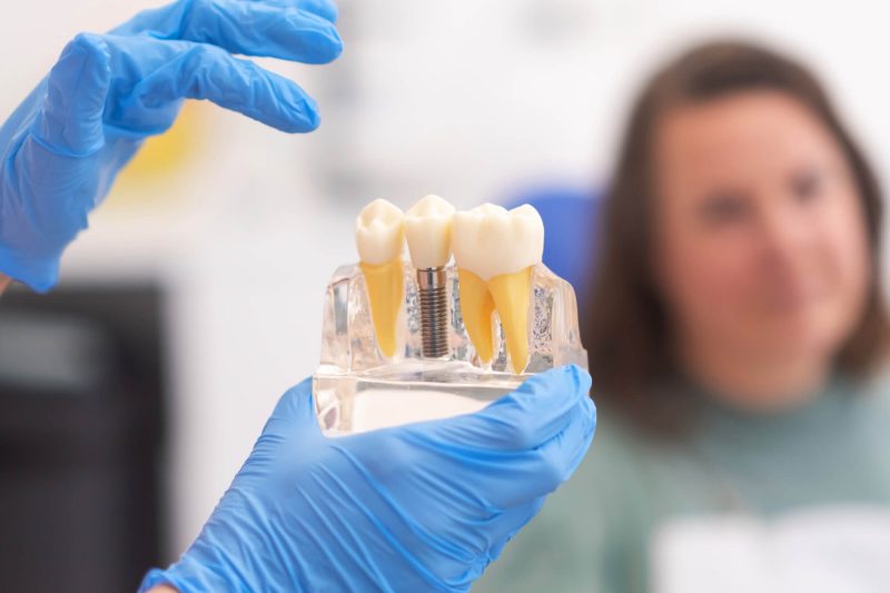 educating-a-patient-about-Affordable-Denture-and-Implants-in-Parkersburg